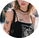 tattoo jagua croix papillon