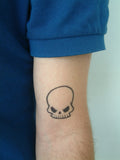 Tatouage monochrome Crâne étrange tattoo 5cm