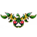 Lower back tattoo cerises