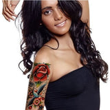 Tatouage old school couvrant tout le bras